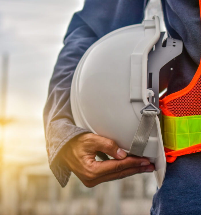 engineer-holding-hard-hat-construction-worker-professional-safety-work-industry-building-person-manager-service Engineer holding hard hat construction worker professional safety work industry building person manager service
