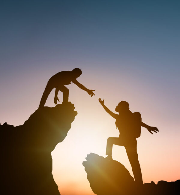help and improve concept, silhouette people helping other hiker help and improve concept, silhouette people helping other hiker climbing rock and mountain